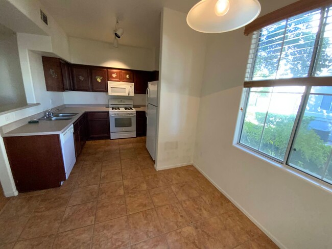 Building Photo - COZY CONDO IN GATED COMMUNITY WITH CLUBHOU...