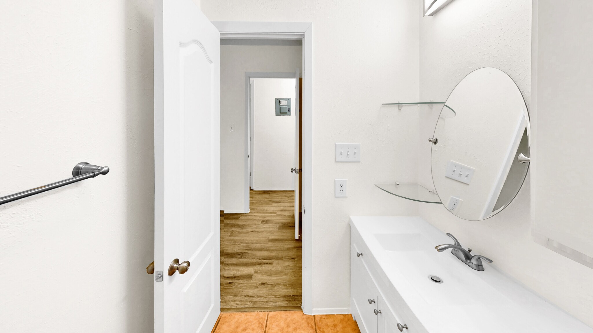 Bathroom with vanity and tile patterned floors - 5906 Wagon Bnd