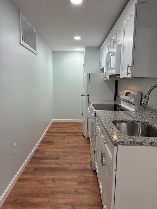 Building Photo - Two Full Living Areas — One Incredible Hom...