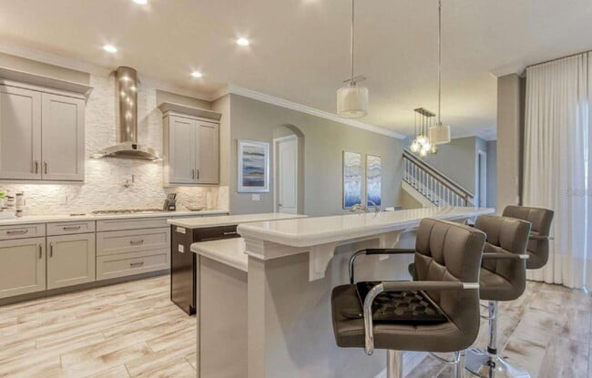 Building Photo - Spacious 4-Bed, 4-Bath Haven in Winter Garden – 3,388 Sq. Ft. of Comfort on Green Mountain Way