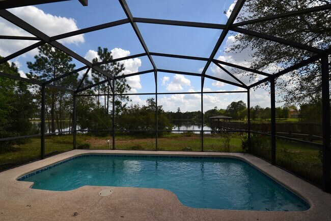 Building Photo - 4 BR Lakefront & Pool Home