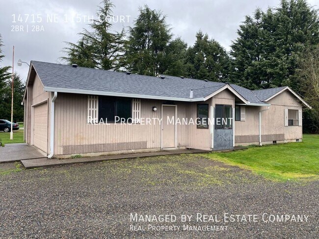 Building Photo - Ranch Style Brush Prairie Home with Large ...