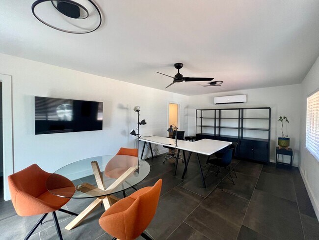 Building Photo - Furnished, 1-Year Long-Term Rental