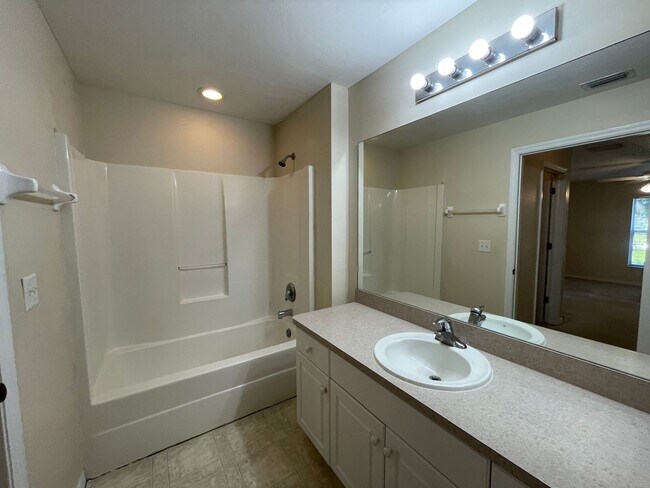 Building Photo - PRICE REDUCTION: Spacious and Charming 3 B...