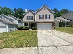 Building Photo - Come take a look at the gorgeous newly renovated 4 bedroom, 2.5 bath, 2 car garage home located i...