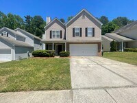 Building Photo - Come take a look at the gorgeous newly renovated 4 bedroom, 2.5 bath, 2 car garage home located i...