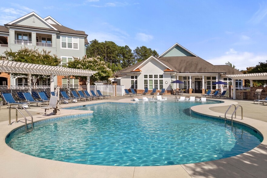 Cool off with a refreshing swim steps from home - Villages at Pecan Grove