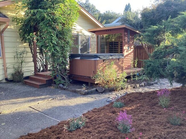 Building Photo - Look No Further, this home has it all- Hot Tub, Sauna, EV Charger, Solar, KOI Pond & More