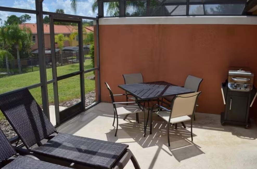 Back porch, fully screened - 3017 Bird of Paradise Ln