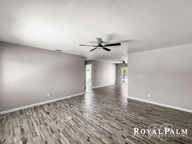 Building Photo - Tree-Lined 2BR/1BA Fort Myers Duplex with Fenced Yard, Storage Shed & In-Unit Laundry!