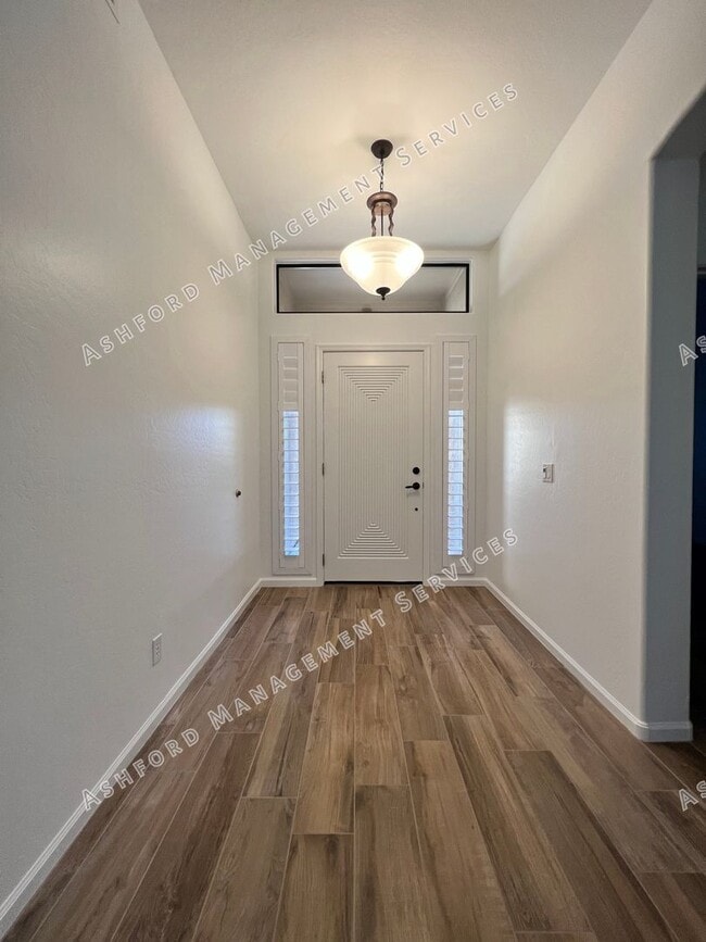 Building Photo - COME HOME TO LUXURY IN GATED GRAYHAWK GOLF...