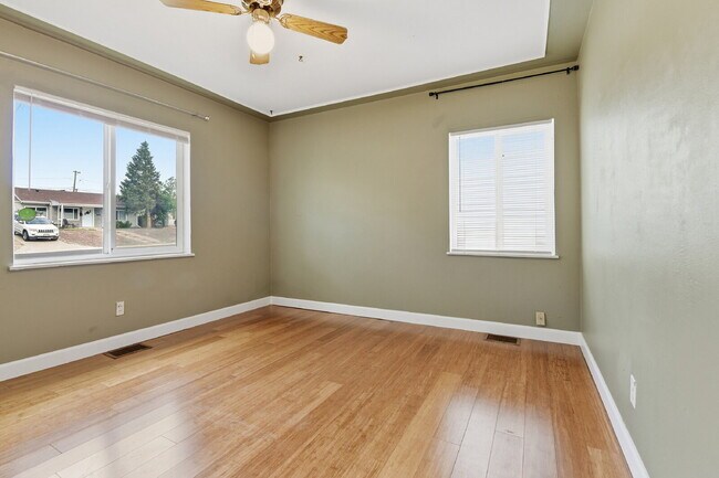 Building Photo - $3,045.95, 3 bed, 2 bath house in Denver with Fenced in Yard and In Unit Laundry!