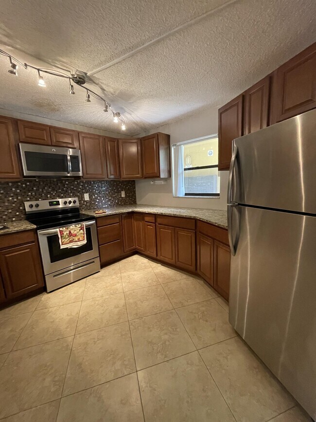 Building Photo - 9044 NW 28th Dr