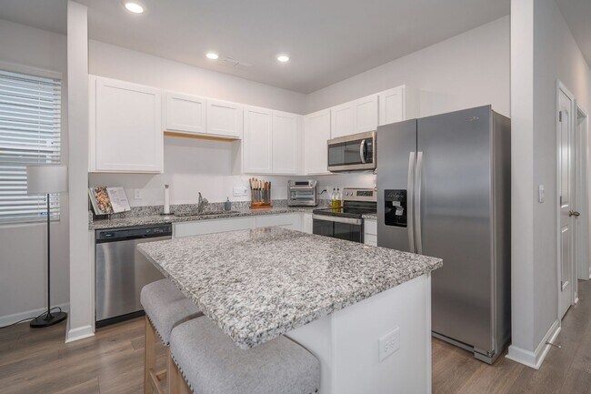 Building Photo - Bright 3-Bed End-Unit Townhome in Cedar Station with Modern Finishes & Private Outdoor Spaces