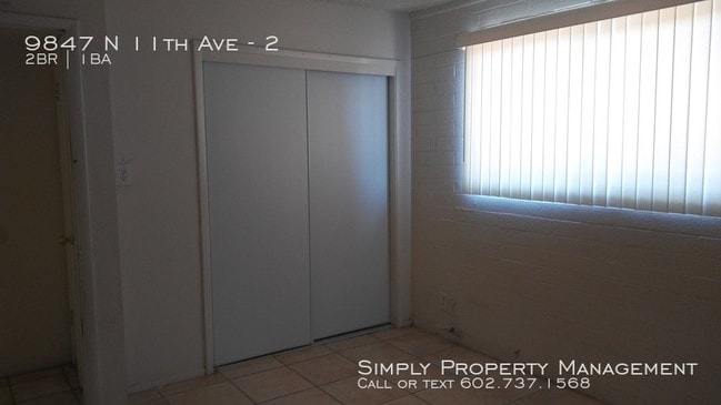 Building Photo - 9847 N 11th Ave