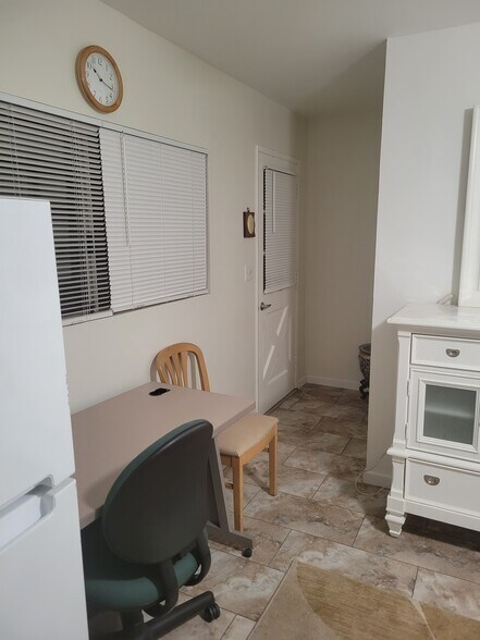 entrance door inside with furniture - 17446 Ludlow St