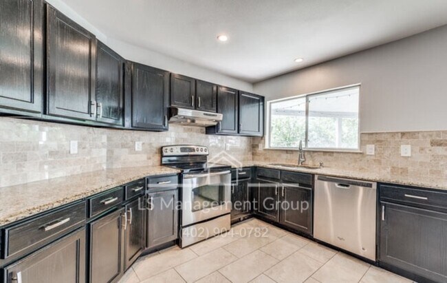 Building Photo - 7618 Van Ness Dr