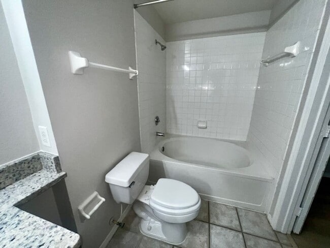 Building Photo - MOVE NOW-Remodeled bathroom & kitchen! NEW VINYL PLANK flooring & fresh paint! 2 bedroom 1 bath c...