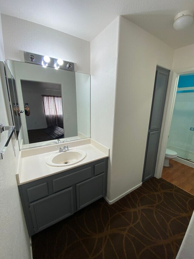 Building Photo - AMERICANA Property Mgmt - Gated 2beds -2baths Townhouse in Spring Valley