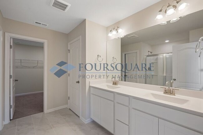 Building Photo - End-Unit Townhome with Loft, Open Floor Plan & Patio, Conveniently Located Near Dining, Shopping,...