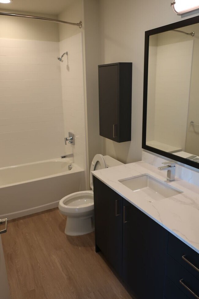 Building Photo - Roomy, 612 Square Foot, 1-Bedroom Home wit...