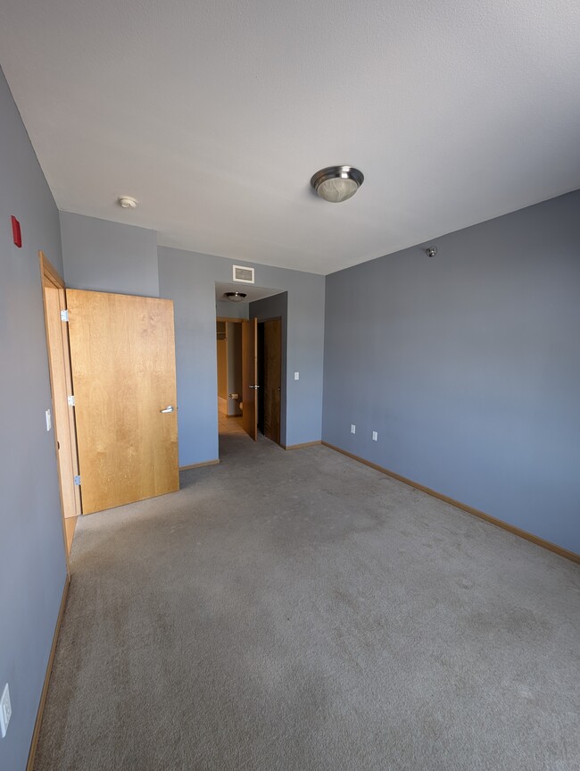 Main floor bedroom - 2121 S Kinnickinnic Ave