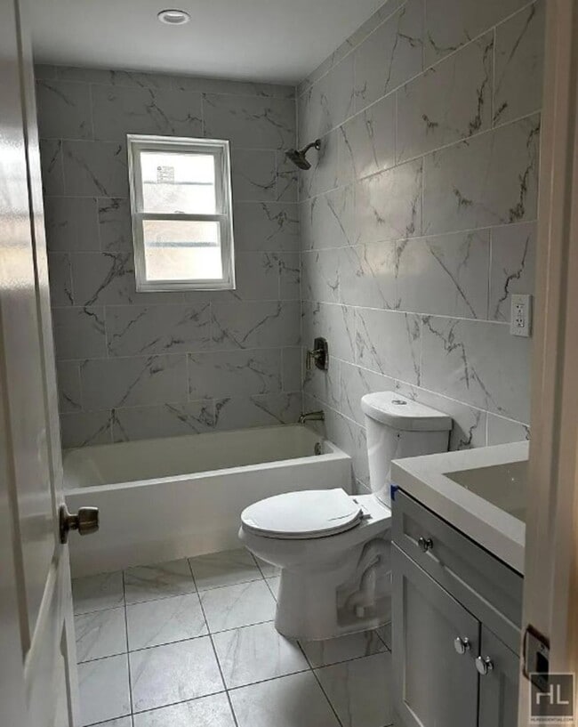 Building Photo - 4 bedroom in QUEENS NY 11434