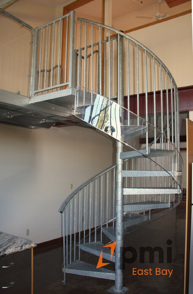 Building Photo - Bright Industrial-Style Loft in a Converte...