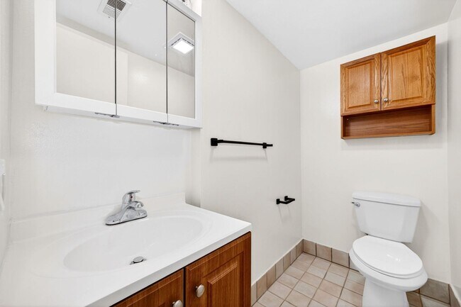 Building Photo - Spacious 3 Bedroom 1.5 Bath Townhome with Brand New A/C & Appliances