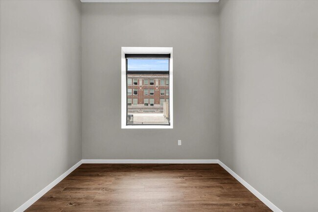 Building Photo - Live in Luxury! Stunning 1-Bedroom Apartment in Downtown Champaign