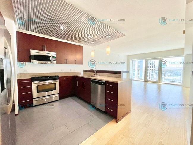 Building Photo - Modern 1 Bedroom 1 Bath Luxury Condo at Th...