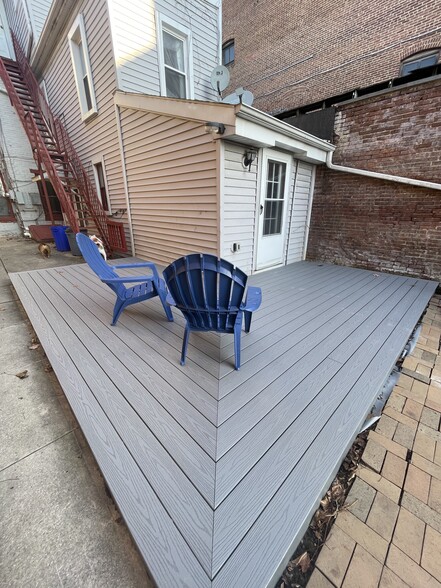 Private deck area. - 334 W Market St