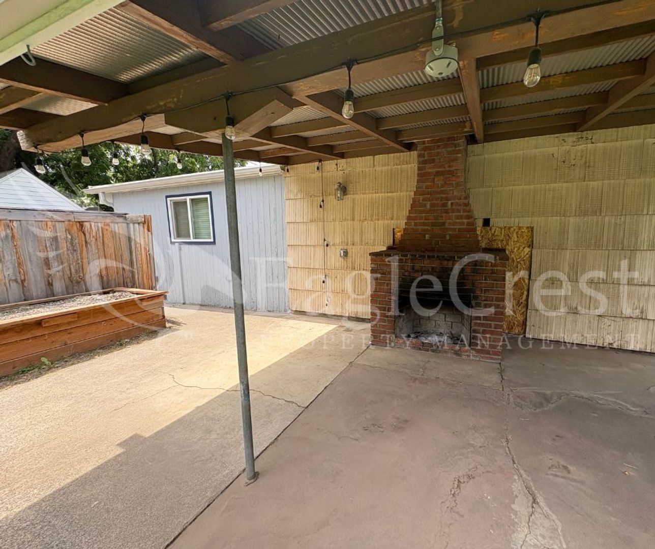 Building Photo - Three Bedroom, Two Bathroom House with Fenced Yard and Outdoor Fireplace