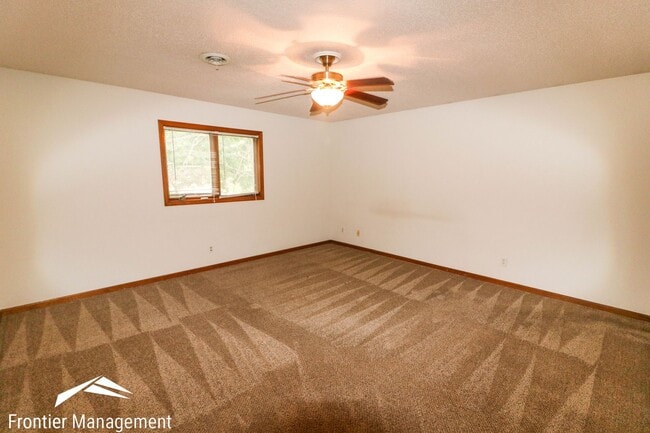 Building Photo - Stunning 2 bedroom duplex in West Manhattan! Large back deck provides beautiful view of Flint Hills!