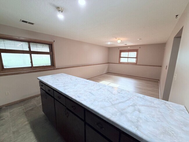 Building Photo - Versatile Oakdale Home Featuring 2 Kitchens, Sun Deck & Mother-in-Law Suite!