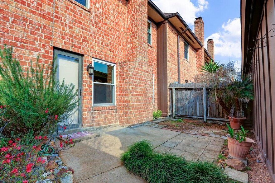 Rear patio for relaxing outside (during the winter months of course!) - 11744 S Kirkwood Rd