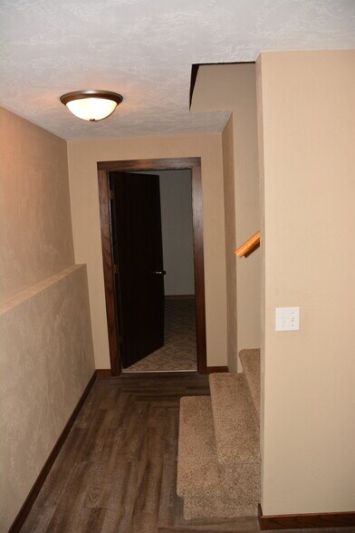 Partially finished basement with oversized bedrooms, laundry hookups and storage. - 325 Cordy Lane