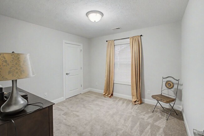 Building Photo - Spacious 4-Bedroom, 3.5-Bathroom Townhome & 2-Car Garage-West Champaign