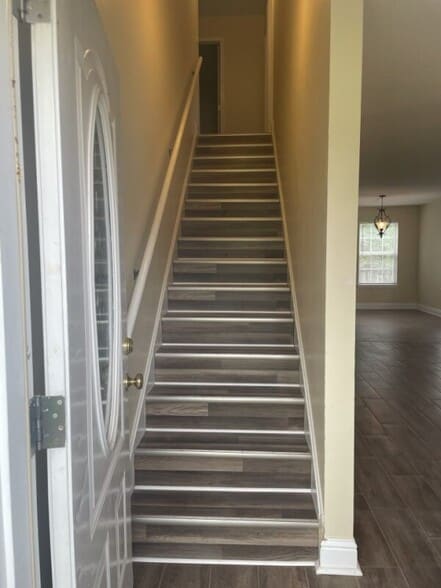 Stairway to second floor. - 10323 Daisy Vestry Rd