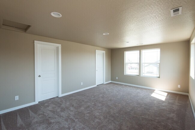 Building Photo - New 4 Bedroom Home in Post Falls with 3 Car Garage!