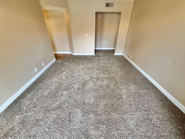 Building Photo - THIS SECOND-FLOOR DESERT SHORES CONDO OFFE...