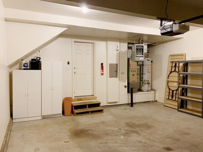 Building Photo - East Anchorage Townhouse with Yard, Garage, and W/D In unit! Close to JBER!