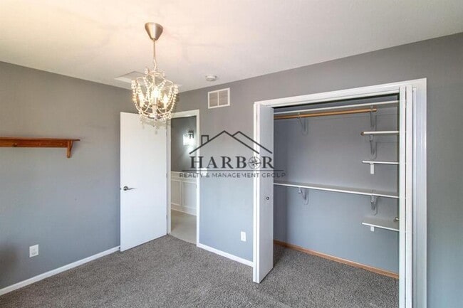 Building Photo - Updated 4 Bedroom Home with Remodeled Kitchen & Tiered Deck