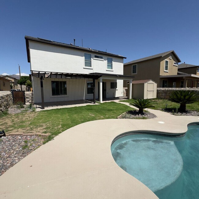 Building Photo - 4 Bedrooms, 3 Baths, a Pool, and Solar Panels!