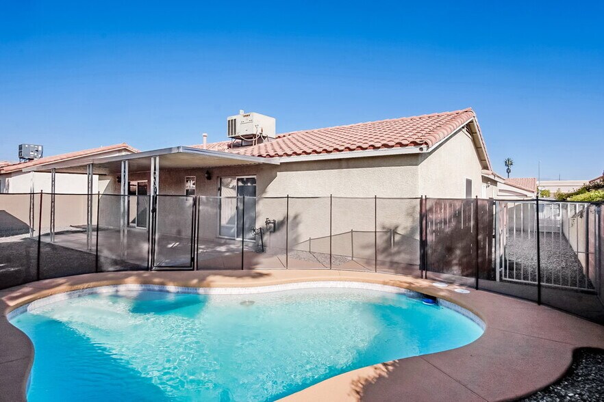 Building Photo - 7125 W Tropical Island Cir
