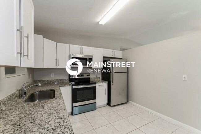 Building Photo - 3 Bedroom Pet-Friendly Home in Cape Coral, FL with Main Street Renewal