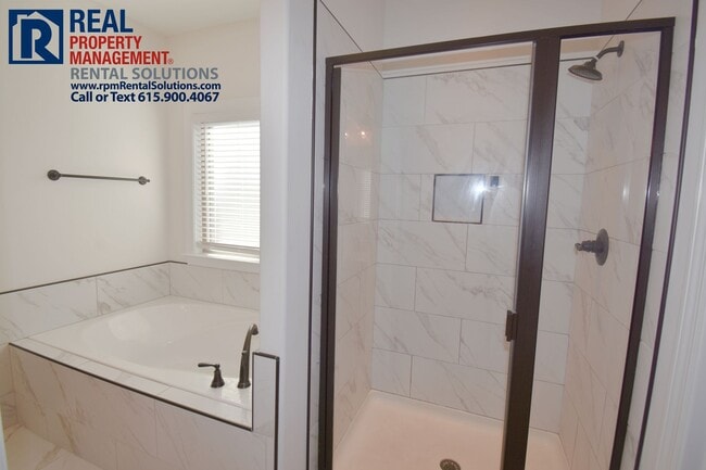 Building Photo - All brick 4 bedroom home plus Bonus room! Garage and covered patio!