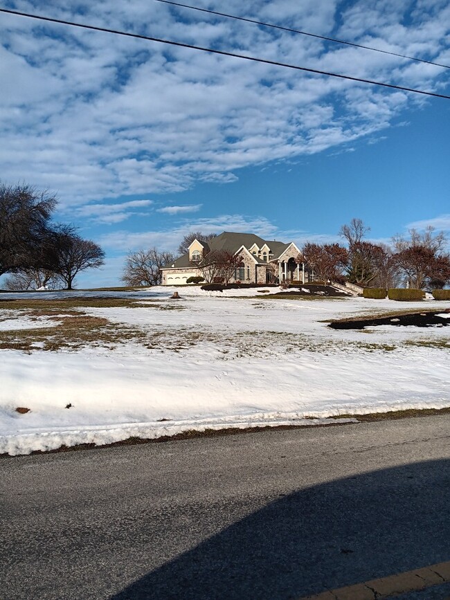 Snow covered front yard - 6245 Iron Bridges Rd