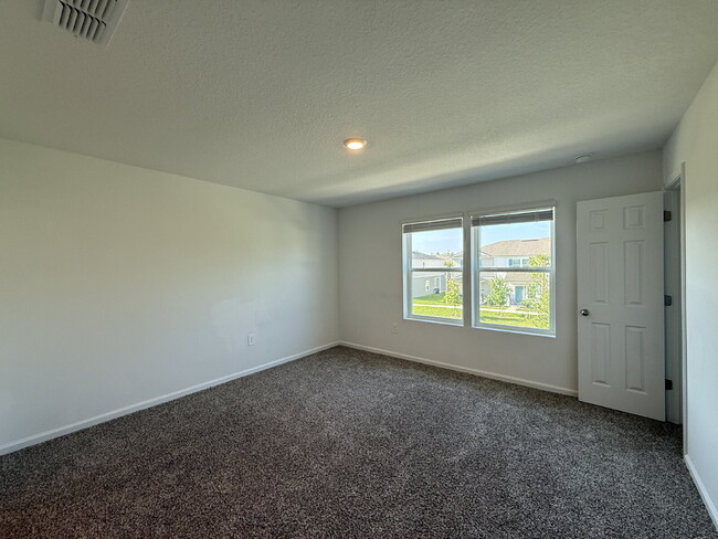 Building Photo - "Charming 2-Bedroom Townhouse Retreat with...