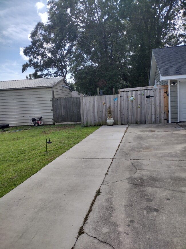 Driveway to park your car and own entrance. - 903 Shem Creek Cir